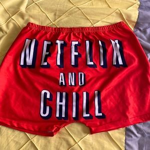 Spandex , material is polyester , size medium , color red